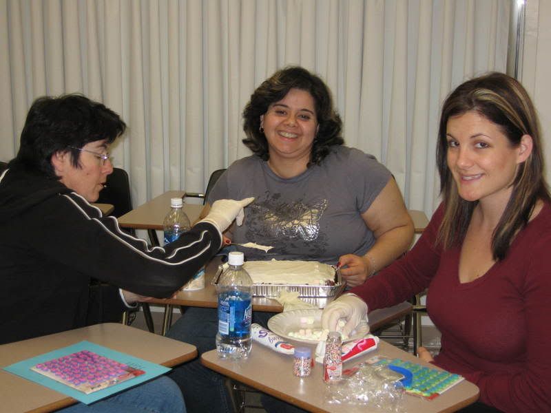 GROUP WORKING ON SINDERELLA CAKE