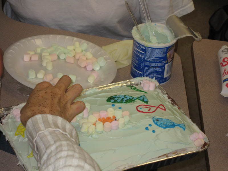 GROUP WORKING ON 1 FISH CAKE