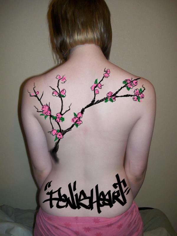 cherry blossom tree tattoo images. cherry blossom tree across
